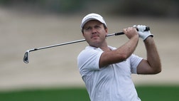  Overnight leader Richard Sterne made a birdie on the th hole Friday to take a one-shot lead over Thorbjorn Olesen and two others after the second round of the Dubai Desert Classic.